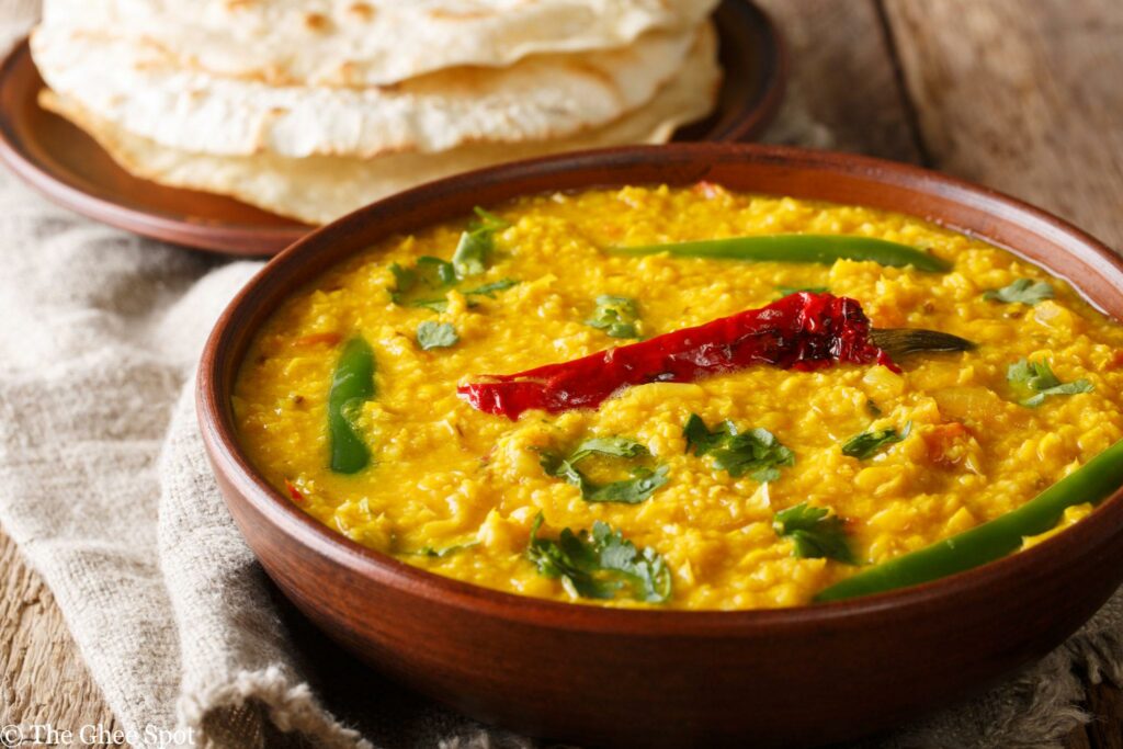 Creamy stewed lentils with a spicy tadka on top.